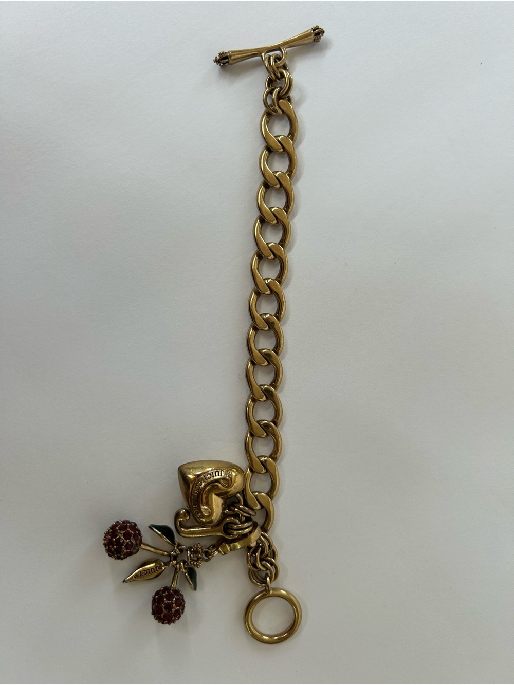 Juicy Couture Gold-Tone Charm Bracelet with Red Crystal Cherry Charm